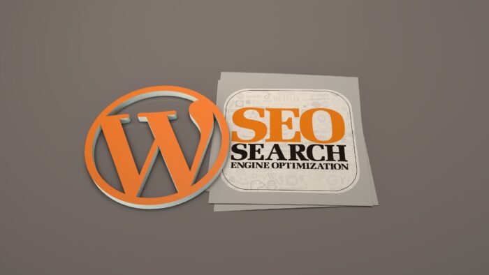 WordPress logo stoji pored SEO oznake na radnom stolu